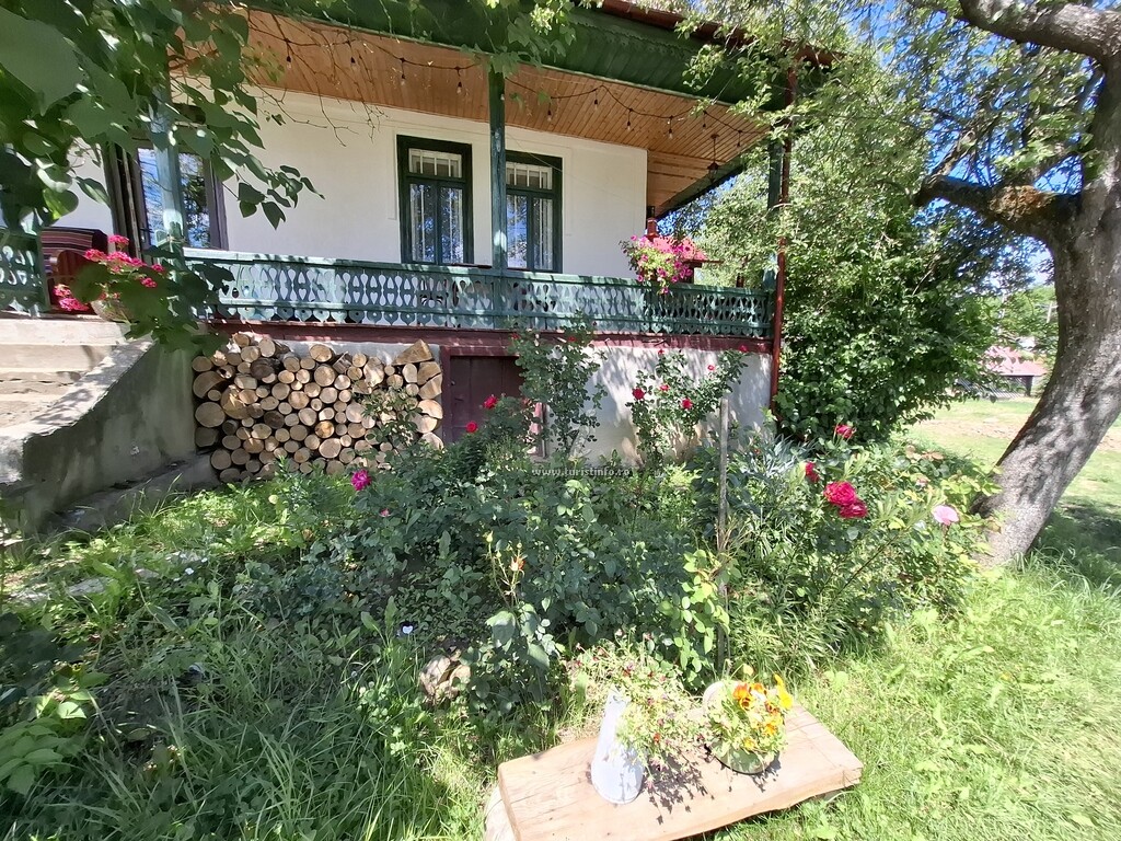 Căsuța cu Prispă